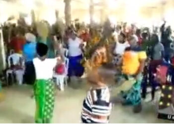 Church members wield cutlasses, guns, other weapons during prayer