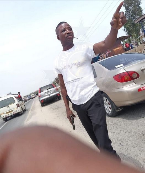 Police arrest man brandishing gun and attacking motorist in a viral video