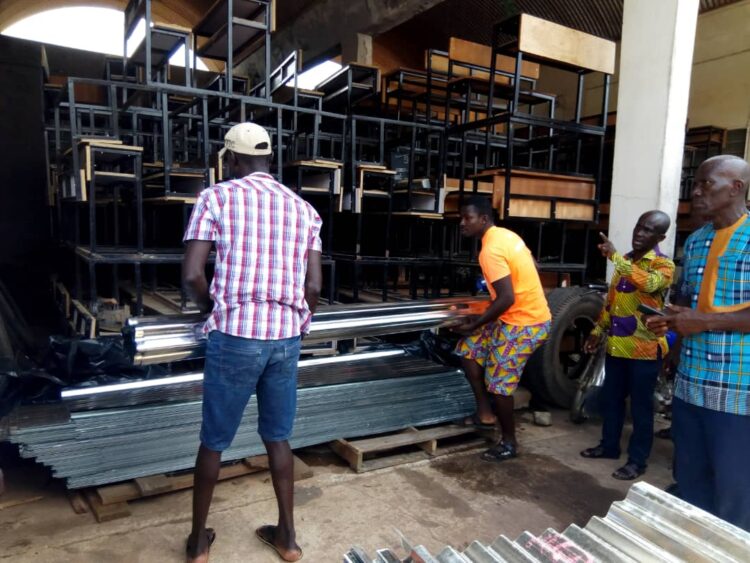 Nkawkaw MP donates packets of roofing sheets to schools displaced by rainstorm