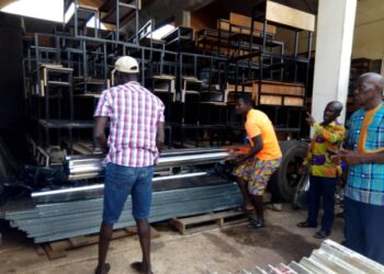 Nkawkaw MP donates packets of roofing sheets to schools displaced by rainstorm