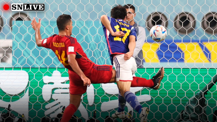 Japan beat Spain as both advance on dramatic night