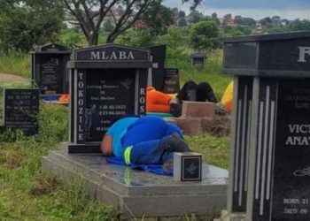 South Africans face charges for sleeping on graves