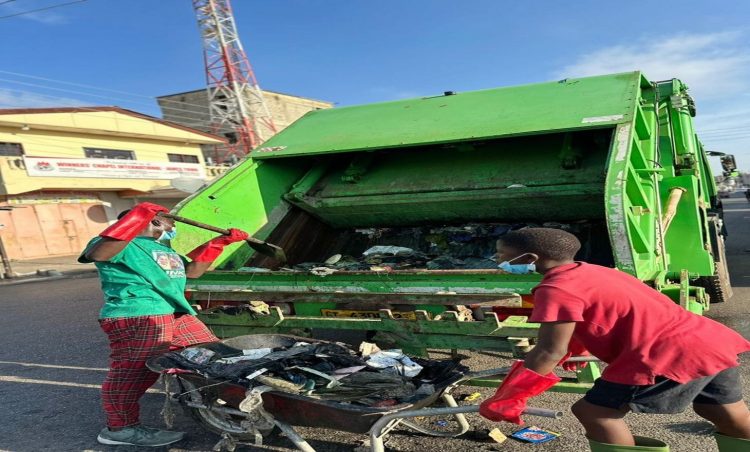 AMA supports Gamashie Youth with logistics to clean, desilt drains