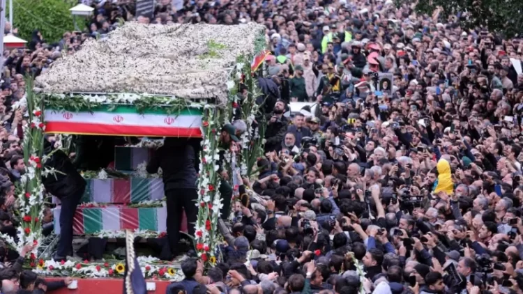 Thousands at Iran president’s funeral procession