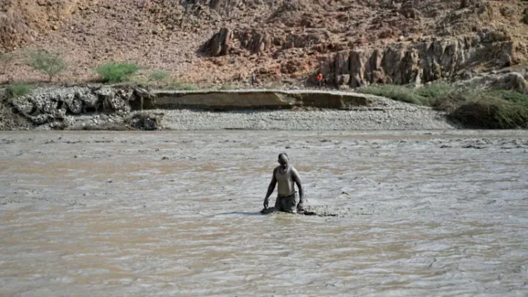 Dam bursts in war-torn Sudan killing 60