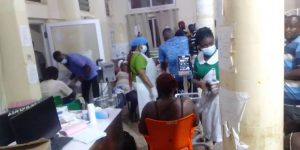 Emergency health workers seen attending the injured victims at the Asessewa government hospital