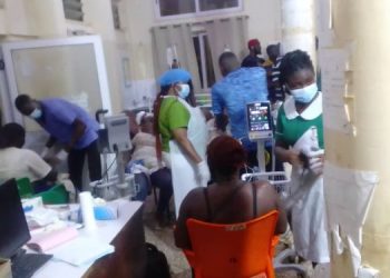Emergency health workers seen attending the injured victims at the Asessewa government hospital